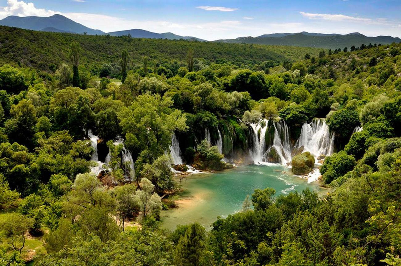 Sightseeing stop in Kravica, Bosnia-Herzegovina for your private car transfer Budva > Banja Luka | Monterrasol Transfers
