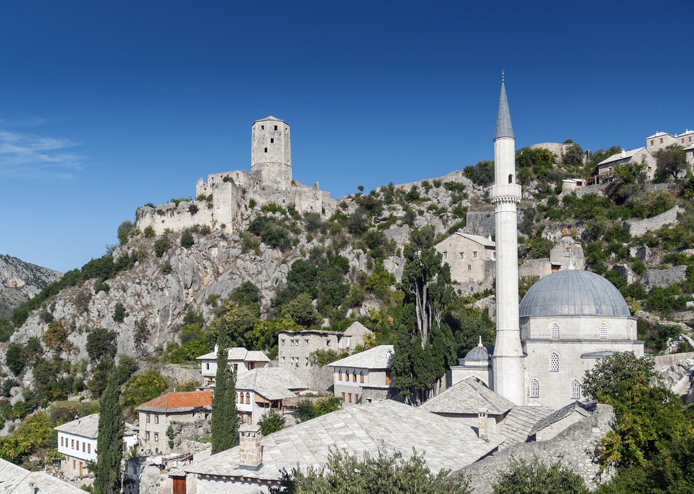 Sightseeing stop in Počitelj (Pocitelj), Bosnia-Herzegovina for your private car transfer Petrovac > Mostar | Monterrasol Transfers